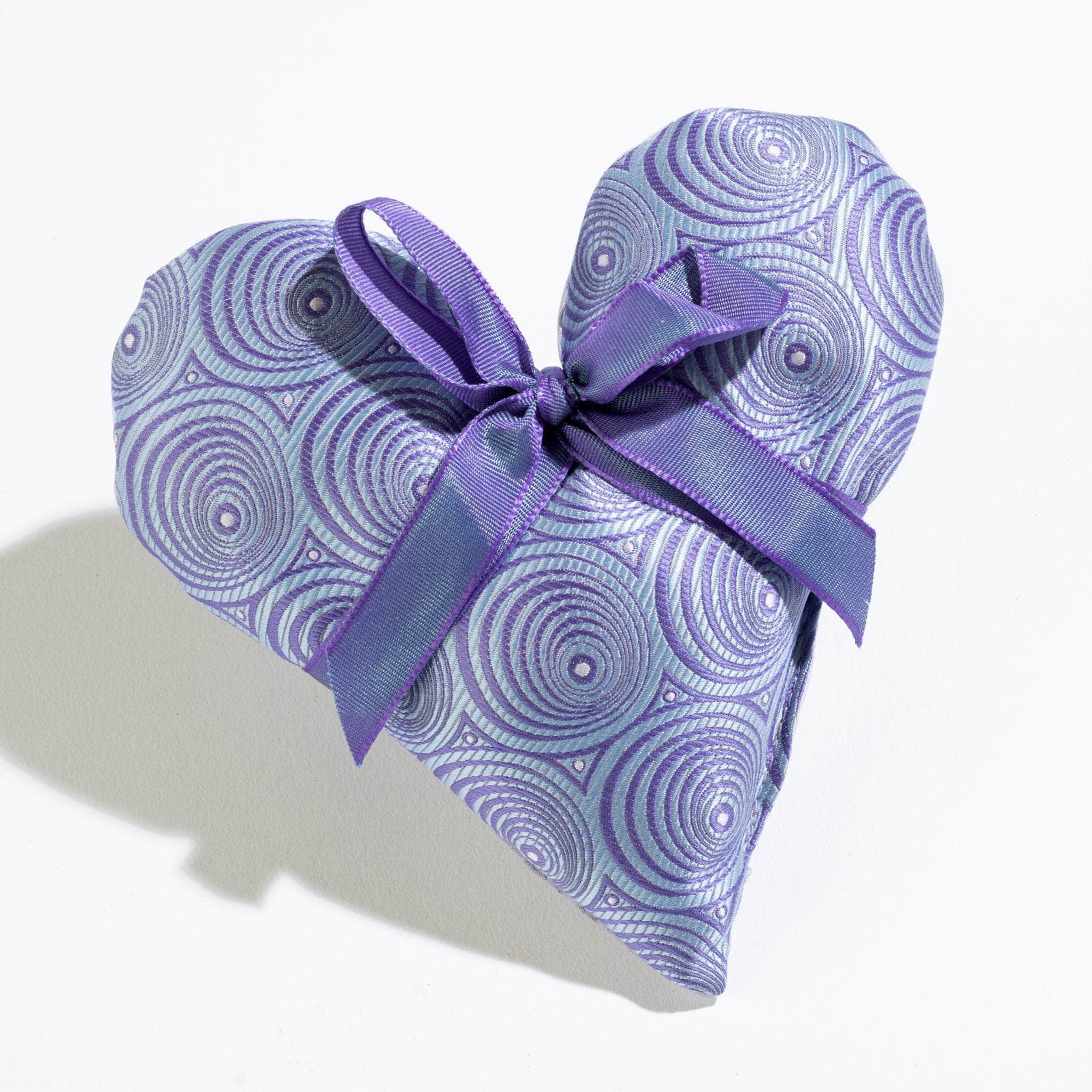 Soft lavender-scented 6" Heart Sachet, perfect for creating a calming at-home spa experience. Its soothing fragrance promotes relaxation, stress relief, and a peaceful ambiance, ideal for your bedroom, closet, or as a thoughtful gift.