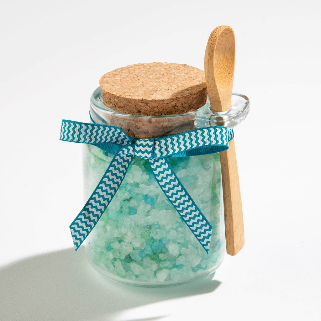 Ocean Aire scent bath salts in a charming honey jar with a wooden spoon, perfect for a relaxing, spa-like experience. Infused with calming aromas, these bath salts help soothe muscles, nourish skin, and create a tranquil ambiance.